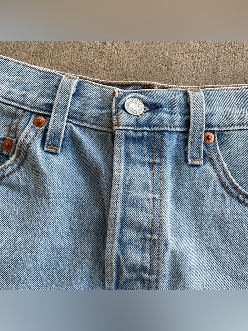 Levi's Women's Icon Skirt in a light-wash blue denim. - Picture 6 of 8